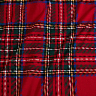 Posh Peanut Ruffled Twirl Dress - Red Tartan Plaid
Close-up of red plaid fabric with a pattern of intersecting lines.