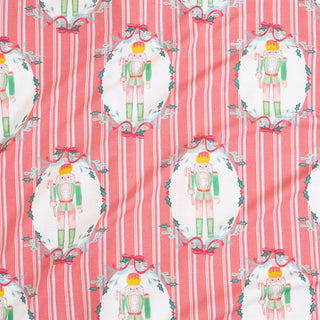 Posh Peanut Classic Pajama Set - Sable
Pattern of nutcrackers and wreaths on a red and white striped background
