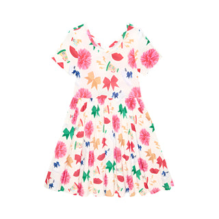 Posh Peanut Sabrina Criss-Cross Twirl Dress Children's dress with colorful floral and bow pattern on a white background