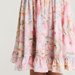 Posh Peanut Ruffled Twirl Dress in Rose Dreams, a cute pink dress with ruffles and a twirling design for young girls.