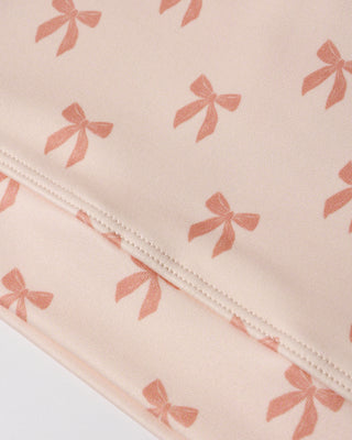 Pink Play by Rylee & Cru Swift Sports Bra with bow detail, designed for comfort and support during active wear.