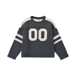 Play by Rylee & Cru Hockey Sweatshirt - Midnight
A dark gray long-sleeve crewneck sweater with cream-colored shoulder panels and sleeve stripes, featuring large cream '00' numbers on the front.