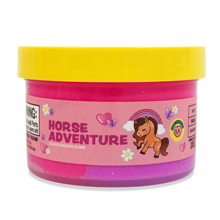 Peachybbies Cloud Slime - Peachy's Horse Adventure
A tub of Cloud Dough Slime in the 'Horse Adventure' flavor, featuring a bright pink body with a contrasting yellow lid and a pink label decorated with a cartoon horse, rainbow, and flowers.