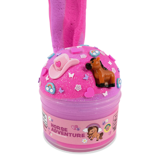 Peachybbies Cloud Slime - Peachy's Horse Adventure
A pink slime toy container labeled 'HORSE ADVENTURE' with a long pink slime tail extending upward. The top is decorated with glitter, a pink cowboy hat, a small brown horse figurine, and pastel decorative pieces on a white background.