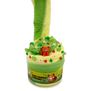 Peachybbies Cloud Slime - Red Panda Forest A green and yellow slime jar with a decorative lid featuring a red panda bear, white flowers, and red hearts, labeled 'RED PANDA FOREST'. A long, thick green and yellow slime tail is stretching upward from the jar against a plain white background.
