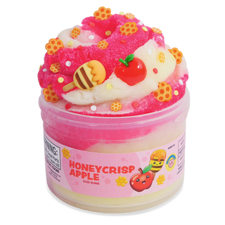 Peachybbies Icee Slime - Honey Crisp Apple
A tub of Honeycrisp Apple flavored ice slime with a pink and white textured top decorated with small yellow honeycomb pieces, a bee toy, and a red apple charm, shown on a white background.