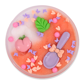 Peachybbies Icee Slime - White Peach Sorbet
A round, translucent pink and white decorative item with embedded pastel butterfly and heart pieces, a green leaf, a pink heart-shaped embellishment, and a purple spoon-shaped accent with a peach bow, shown on a plain white background.