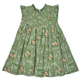 Pink Chicken Girls Stevie Dress - Football Field
A sleeveless green dress with a football field and football print, featuring ruffled shoulder straps and a smocked bodice, shown against a plain white background.
