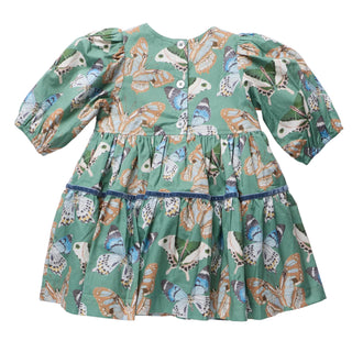 Pink Chicken Girls Maribelle Dress - Green Butterflies
A green children's dress with a butterfly print, featuring puff sleeves, a buttoned neckline, and a tiered skirt, laid flat on a light gray background.