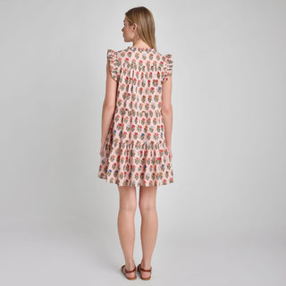 Pink Chicken Womens Kalani Dress - Multi Flower Drop
Woman wearing a floral dress on a plain background