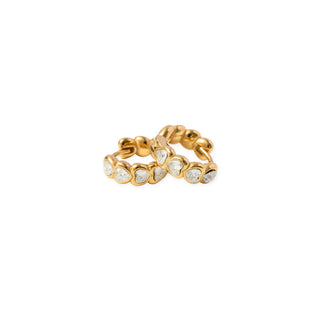Pip Pop Post Earrings - Heart Gem Hoop Diamond
Gold ring with embedded stones on a white background