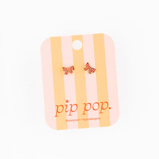 Pip Pop Post Earrings - Striped Bow
Product packaging with 'pip pop' branding on a white background