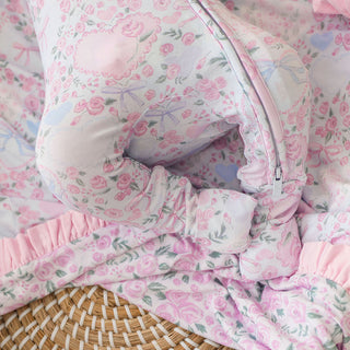 Posh Peanut Convertible One Piece - Josephine
Floral patterned baby crib set with pink and white colors