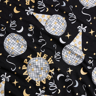 Posh Peanut Midnight Bash
Fabric with New Year's Eve decorations including disco balls, party hats, and confetti on a black background.
