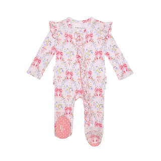 Posh Peanut Picot Footie Ruffled Zippered One Piece - Harriet
A baby footed sleeper in a light pink color with a delicate floral print and pink bow motifs, featuring ruffled trim along the collar and cuffs, and a pink polka-dot pattern on the sole of one foot.