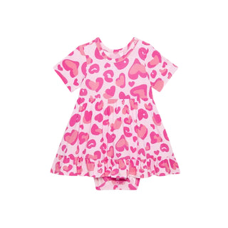 Posh Peanut Ruffled Twirl Bodysuit Dress - Love Leopard
Pink dress with heart pattern on a white background