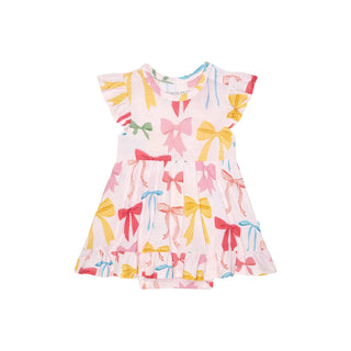 Posh Peanut Ruffled Twirl Bodysuit Dress - Shawna
Children's dress with colorful bow pattern on a white background