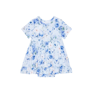 Posh Peanut Ruffled Twirl Bodysuit Dress - Trista
Floral dress with blue and white flowers on a light background