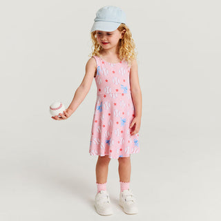 Posh Peanut Twist Back Skater Dress - Gina
Young girl in a pink dress with butterfly pattern holding a baseball, wearing a light blue cap on a white background