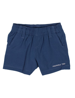 Properly Tied Boys Pintail Short - Washed Navy
Blue shorts with 'Properly Tied' branding on a white background