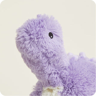 Purple Long Neck Dinosaur Warmies
Close-up of a purple plush toy on a light beige background