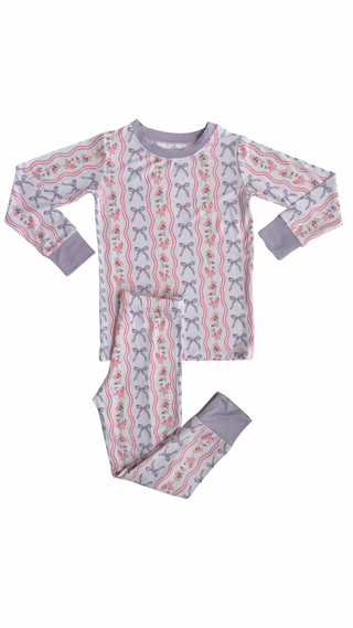 In My Jammers Two Piece Set - Purple Amelia Bow
Children's pajama set with a pattern on a white background