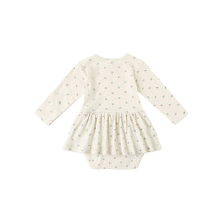 Quincy Mae Pointelle Skirted Bodysuit - Blue Ditsy
White baby dress with long sleeves on a white background