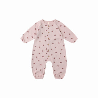 Quincy Mae Waffle Long Sleeve Jumpsuit - Hearts
Pink baby onesie with heart pattern on a white background