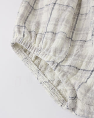 Quincy Mae Alina Dress - Blue Plaid
Textured fabric with a grid pattern on a light background