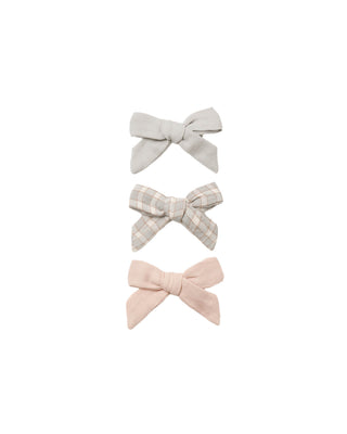 Set of Quincy Mae bow hair clips featuring cloud, blue gingham, and dusty rose designs on hair pins and clips.