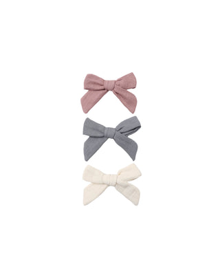 Set of Quincy Mae bow hair clips in mulberry, slate, and natural colors, featuring cute, easy-to-use hair pins and clips for children.