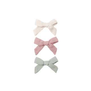 Quincy Mae Bow w/Clip Set - Natural + Mauve + Sage
Three fabric bows in white, pink, and gray on a white background