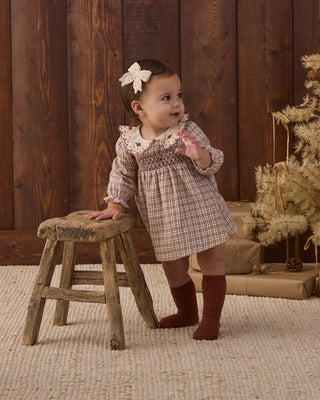 Quincy Mae Callie Dress in Christmas plaid fabric, featuring a festive pattern and comfortable design for young children.