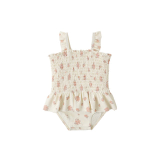 Quincy Mae Smocked One Piece Swimsuit - Garden Rose
Floral-patterned baby romper on a white background