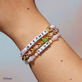 Little Words Project Bracelet - Disney Princess: Rapunzel
Bracelets with motivational phrases on a wrist against a neutral background