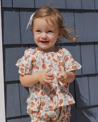 Rylee & Cru Americana Floral butterfly top and bloomer set for baby girl, featuring colorful floral print and comfortable fabric.