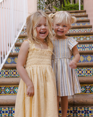 Rylee & Cru Hanna Lemon Dress for girls featuring bright yellow fabric, short sleeves, and a playful, casual style.