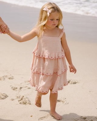 Rylee & Cru petal gingham ruffled swing dress for girls, featuring a playful, fluttery design and soft fabric in a lifestyle setting.