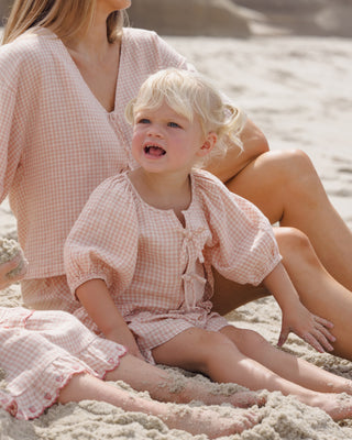 Rylee & Cru Juniper Petal Gingham 2-piece outfit for children, featuring a gingham top and matching bottoms in a lifestyle setting.