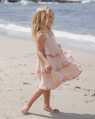 Rylee & Cru petal gingham ruffled swing dress for girls, soft fabric with ruffle details, styled in a lifestyle setting.