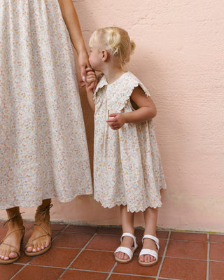 Rylee & Cru Porter Dress in Summer Garden print, casual dress with floral pattern, worn by a model outdoors.