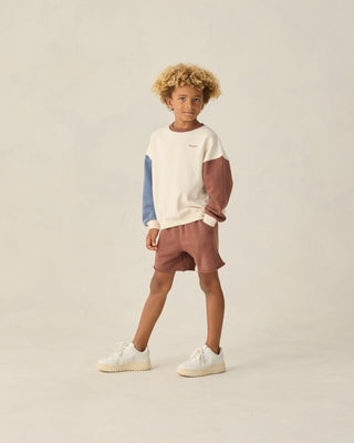 Play by Rylee & Cru Relaxed Sweatshirt - Natural
Child wearing a color-blocked sweater and shorts on a plain background