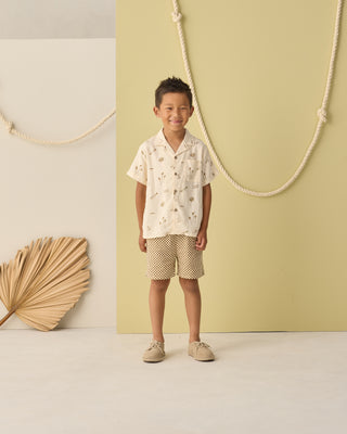 Rylee & Cru Ocre Check swimwear boardshort with a plaid pattern, designed for comfortable beach or poolside wear.