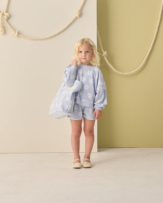 Rylee & Cru Karli outfit set in periwinkle with daisy print, featuring a coordinating top and bottoms for children.