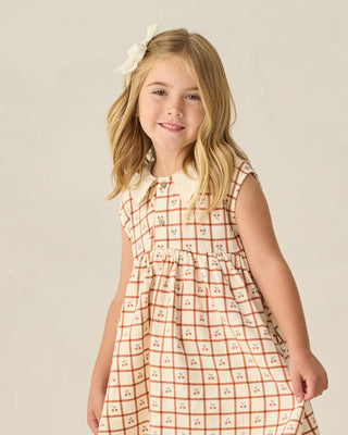 Rylee & Cru cherry check collared babydoll dress with long sleeves and a relaxed fit, perfect for casual and special occasions.