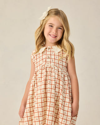 Rylee & Cru cherry check collared babydoll dress for girls, featuring a playful short-sleeve design and classic pattern.