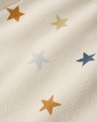 Rylee & Cru Kaycee Stars outfit set for babies, featuring a natural-colored top and matching star-patterned pants.