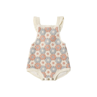 Rylee & Cru crochet romper in ivory with light pink and blue accents, featuring a soft, knitted texture and sleeveless design.