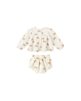 Rylee & Cru Sophia Top + Bloomer Set - Ruby Bows
Children's outfit with long-sleeve top and bloomers on a white background