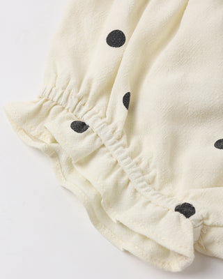 Rylee & Cru Lala polka dot outfit set for babies, featuring a soft natural-colored top and matching bottoms.